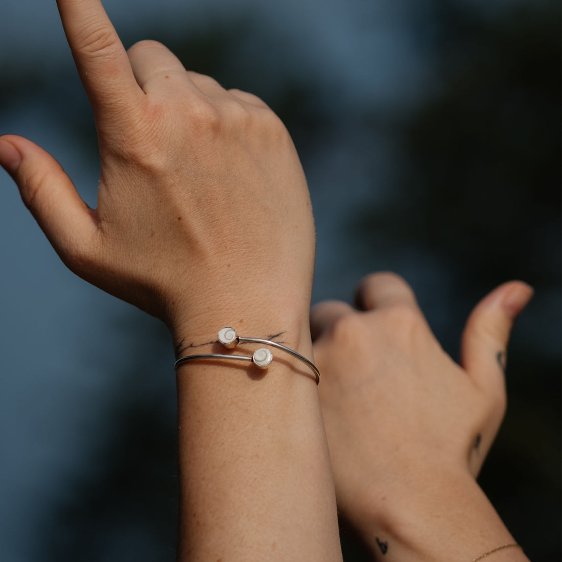 Operculi Silver Bangle