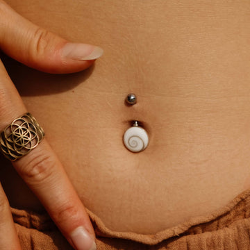 Belly button piercing Operca