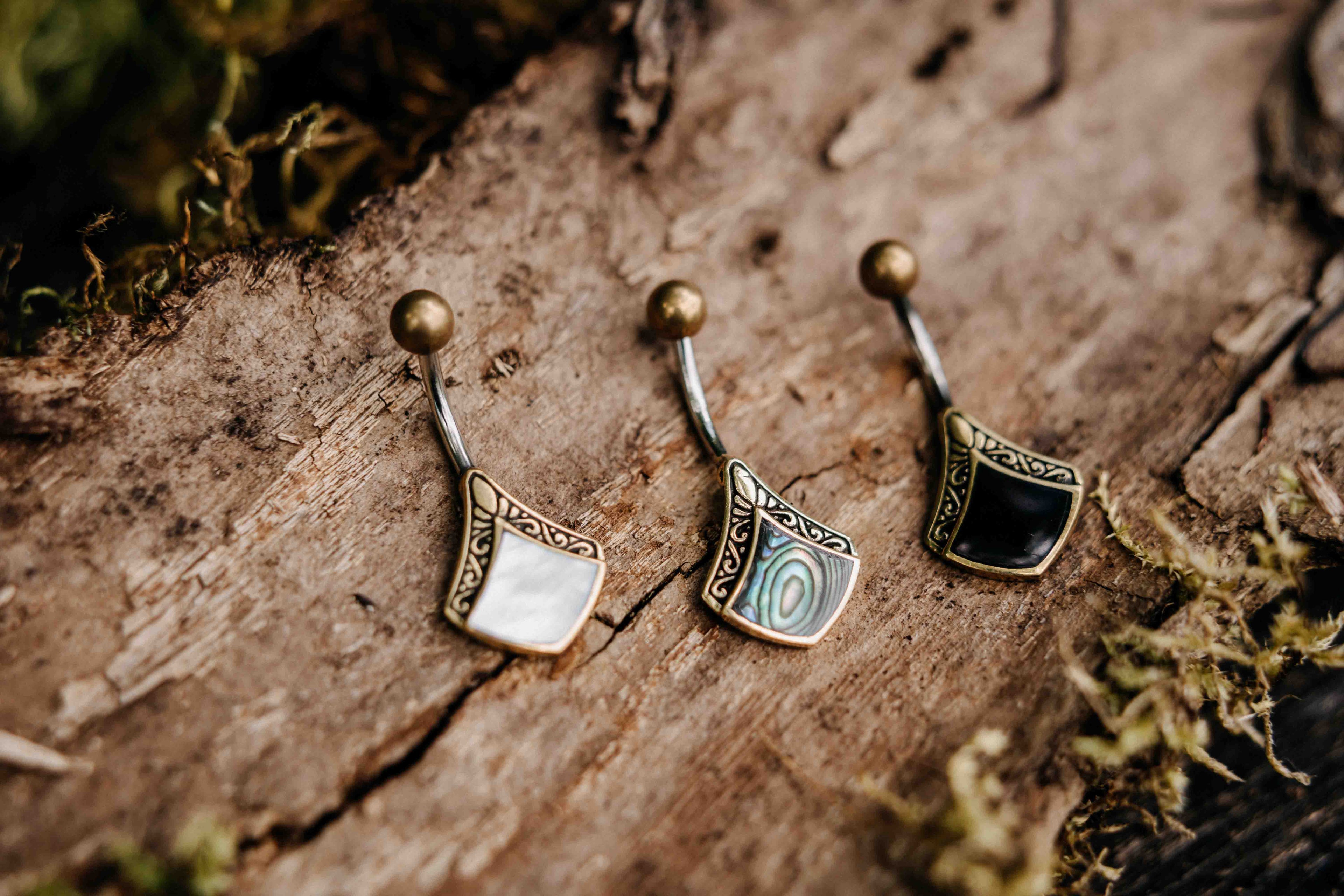 Slider Bauchnabelpiercings auf Holz Mobile1621243260e1af0c20-2